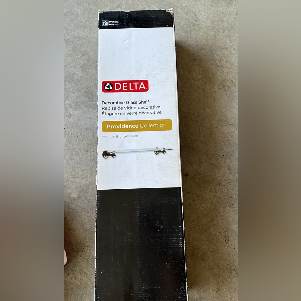 Delta glass shelf